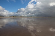 The sky was mirrored on the slick Inch Beach.